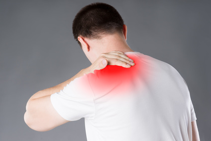 Neck pain, man suffering from backache on gray background